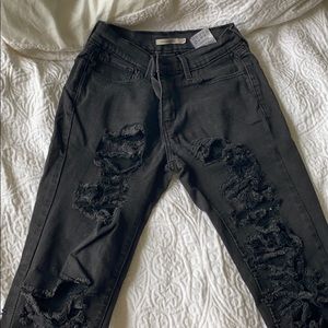 Vintage Black skinnies with holes